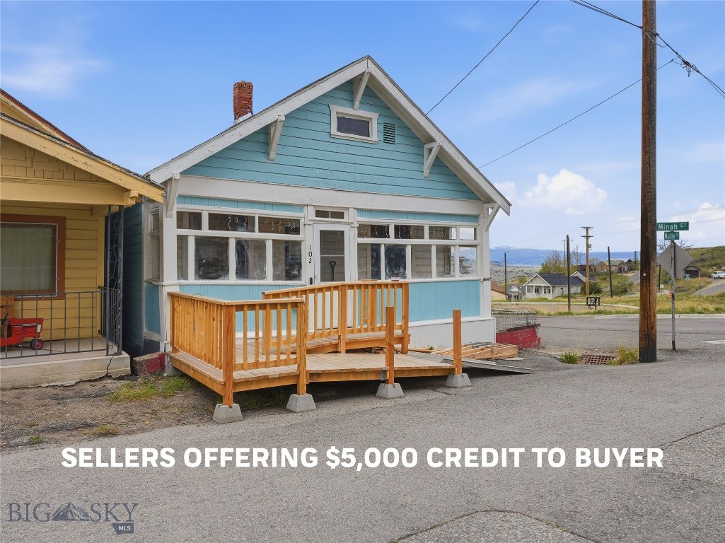 Seller now offering a $5,000 Buyer credit! 
Charming and functional single-level home on a desirable corner lot directly across from Centerville Park! This 2-bedroom, 1-bath home offers 894 sq ft of comfortable living space with an open floor plan connecting the living room, dining area, and oversized kitchen. The kitchen features a large island, abundant cupboard storage, and extensive counter space — perfect for cooking, entertaining, or everyday living.

Original hardwood floors add character and warmth, while updated interior paint gives the home a fresh feel. The spacious bathroom includes washer/dryer hookups and plenty of room for additional storage or organization.

Enjoy relaxing in the enclosed front porch/sunroom or on the covered rear porch overlooking the fenced backyard. A brand-new front deck with accessible ramp will be completed prior to closing, making this home especially functional for accessible, single-level living.

The exterior features newer paint and roof for added peace of mind. Conveniently located just one block from N Main St and close to BA&P Hill Trail and Mountain Con Mine recreation areas, this property offers easy access to outdoor activities, parks, and town amenities.

A great opportunity for comfortable, accessible living in a convenient location!