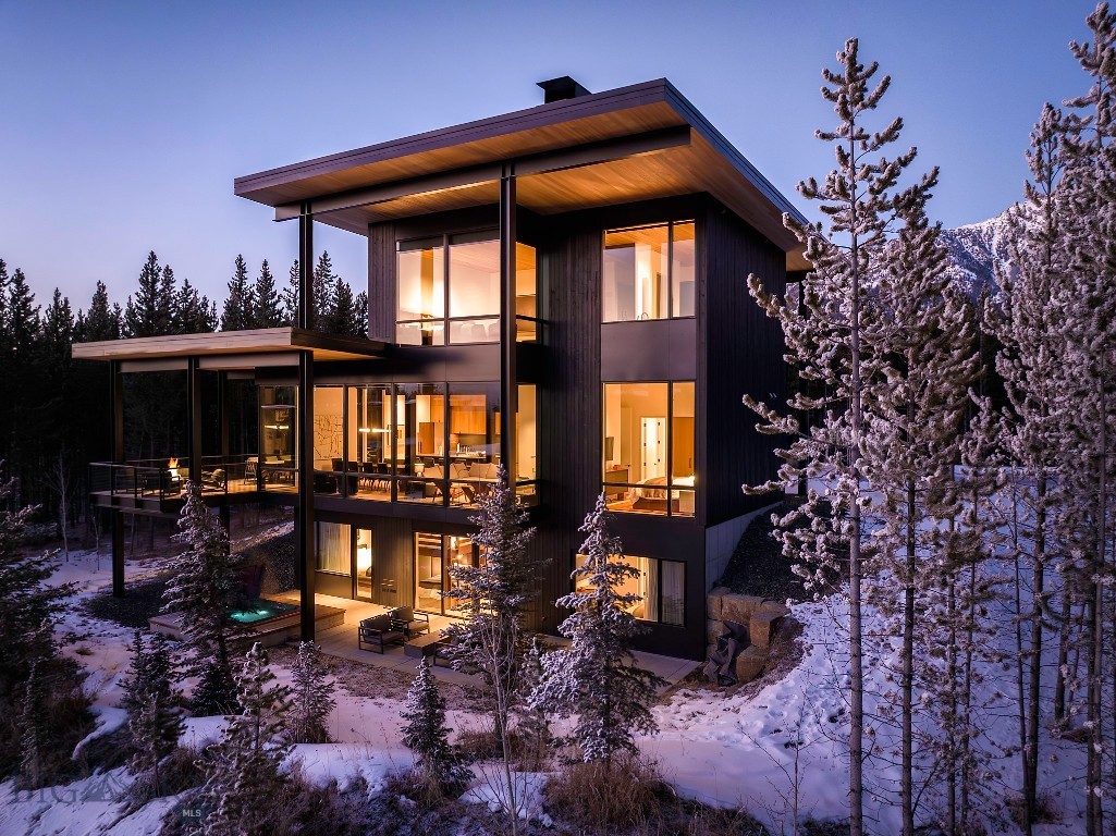 Situated in the untamed wilderness of Montana, this One&Only Moonlight Basin Private Home showcases beautifully designed interiors that blend effortlessly with the surrounding landscape of forests and peaks. The five-bedroom residence spans 4,428 square feet across three levels, offering a refined sense of space and privacy. Representing some of the most exceptional living in all of Big Sky, this contemporary home features floor-to-ceiling windows, roaring fireplaces, and timeless finishes throughout. Surrounded by evergreen forests and snow-capped mountains, this expansive retreat provides an idyllic setting for family and friends to gather, unwind, and rejuvenate after a day of adventure in the great outdoors.