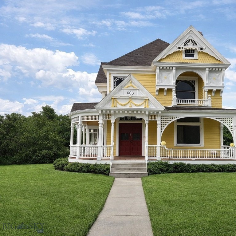 Step into Montana history with this stunning 1890s Queen Anne Victorian, built by Senator Ed Scharnikow and originally delivered by train. This unique stick-built home sits on 18,295 sq ft and features 3 bedrooms, 2 bathrooms, and remarkable historical charm throughout. Inside, you'll find original hardwood floors, stained glass windows, and intricate architectural details that highlight the quality craftsmanship of the era. The expansive lot provides plenty of outdoor space, while the home's character and layout offer versatile living options. This one-of-a-kind property blends historical significance with spacious urban living — a truly rare opportunity.