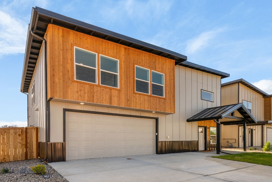 Your mountain modern dream metal shed roof luxury home with protected Bridger and Custer Gallatin Views. 3 of them already sold limited units available. COMPLETED AND READY FOR MOVE-IN! Spectacular corner lot with protected Bridger Views only 4 minutes to the new Rosauers and 8 minutes to Pickleball at The Picklr! Brand new 4/2 1/2 home with luxury finishes throughout and metal roofing! As you enter this home you are greeting by a giant kitchen and OPEN floorplan.  Elegant high end luxury vinyl plank graces the floors, solid wood cabinets adorned by Calacatta waterfall countertops. Island seats 4 and overlooks OPEN dining & living room w/fireplace, covered porch and back yard in view. Fully outfitted with fenced yard, backyard irrigation and landscaping and air conditioning. Master suite upstairs has views of the Bridger range to Custer Gallatin. There also is a HUGE loft perfect for an office or a second living room with TV/workout etc.  Garage is heated and cooled and with epoxy floors so could be used as bonus room/game room. Come see this one of a kind modern home close to everything and south of the interstate bordering Bozeman! No traffic issues only 15 minutes to Main Street Bozeman and 16 minutes to MSU!
Interior Upgrades: Solid Surface Luxury Vinyl Plank flooring $8,000,Upgraded Wood cabinetry $5,000,Quartz countertops $10,000,Waterfall Quartz Island $3,000,Fireplace $4,000,Refrigerator $1,500,Air Conditioning $9,000 >>>Heated and air conditioned garage could be used as bonus room/man cave with epoxy floors. EXTERIOR UPGRADES: Metal standing seam roof $10,000,Slab construction (no crawl space) $12,000,Fenced Yard $15,000,Sod in backyard $9,000,Sprinkler system $6,000