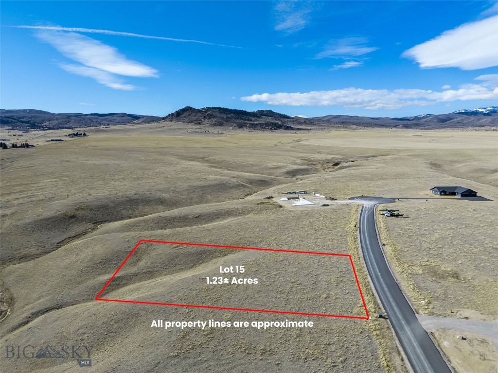 Lot 15 offers 1.23± acres within a thoughtfully planned 55-lot community, with parcels ranging from approximately 1 to 2 acres. The subdivision spans 165± acres total, providing generous open space and excellent opportunities to enjoy local wildlife. Paved roads are in place, with mailboxes, power, and fiber optic service to each lot. Located approximately three miles from downtown Ennis, this property offers sweeping views in all directions and convenient access to town amenities. Wells throughout the subdivision range from approximately 200 to 350 feet in depth, producing 12 to 60± GPM. The licensed Montana listing agent is a member of the selling entity.