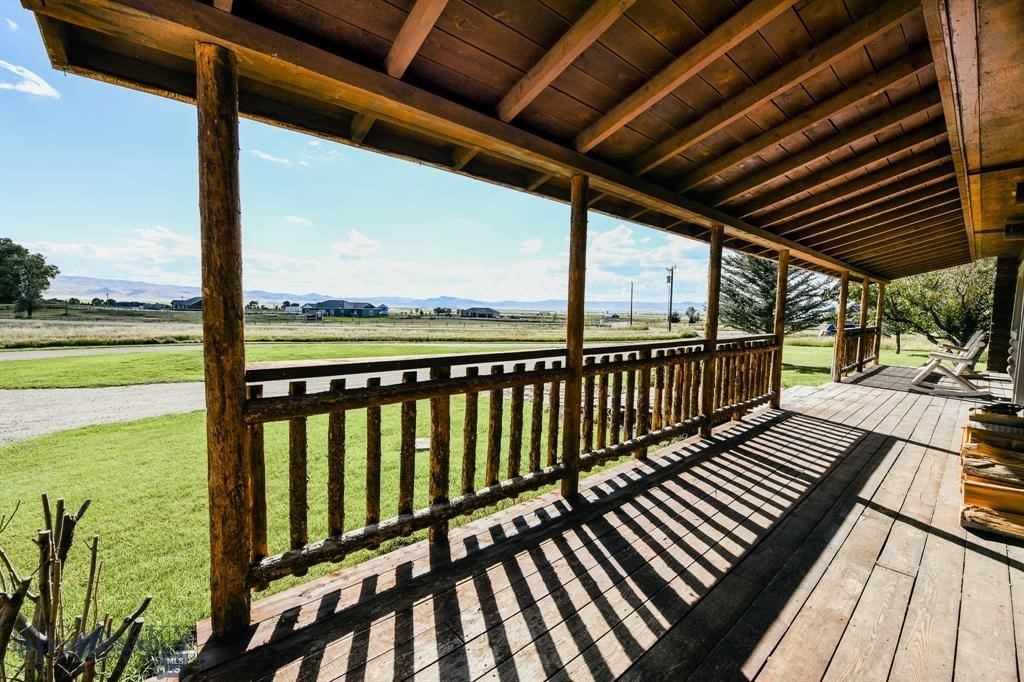 Welcome to the perfect hobby farm with 5097 Sq feet of living space!  Experience the perfect blend of rustic charm, income potential, and wide open space with this exceptional 11.64 acre horse property. Fully fenced and thoughtfully designed, this private retreat offers breathtaking views, a peaceful rural setting, and the freedom of very light covenants. Take advantage of this rare opportunity to own an investment property that pays for itself. Potential for three or more sources of income from three separate living spaces and room of horses. Configure the space any way you desire. 

The stunning log-sided main home spans 4232 Sq feet and showcases soaring vaulted ceilings that create a warm, open atmosphere filled with natural light. Recent updates include a refurbished metal roof, new appliances, and granite countertops offering both style and peace of mind. The newly remodeled basement living space adds incredible versatility-ideal for entertaining, multi -generational living, or a private guest retreat. Guests can enjoy the private patio and the two private entrances to access this living space. This home offers multiple extra rooms for an office, den, game room or storage. Bring your imagination and design the space to your own personal liking and need. 

Perfectly suited for an equestrian lifestyle or hobby farm, the property is fully equipped with a chicken coop, livestock pens, a metal three sided livestock barn, and lots of room to add to the existing structures. A dedicated garden area provides space to grow your own food, while 20 newly planted Lanceleaf Cottonwood trees and mature shade trees enhance the landscape and create a peaceful outdoor setting. An interior controlled underground irrigation system adds convenience  and efficiency for maintaining grounds while you're home or away. 

Adding to its unique appeal, the property includes a newly remodeled 865 Sq Ft fully furnished AirBnb or rental, offering immediate income potential or a comfortable space for guests or extended family. This space includes a private viewing deck and a fenced dog run. 

Whether you're seeking a serene homestead, an investment opportunity, or both, this property delivers unmatched versatility, privacy and true country living just minutes from town. 

Dont miss this rare opportunity to own a one-of-a-kind rural retreat!