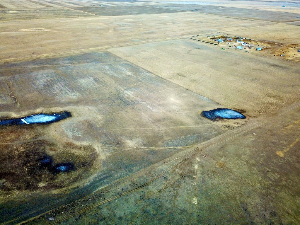 Bordering public state land that leads to the Milk River, this 320-acre property northwest of Havre, Montana offers a blend of tillable ground and grazing acres, making it a versatile opportunity for agriculture, livestock, or land investment. With legal access via Road 220 N., perimeter fencing, and electricity nearby, the property is ready for a variety of uses. Wide-open prairie views and the peaceful Hi-Line setting create the kind of space that’s getting harder to find. Antelope and deer frequent the area offering hunting opportunities. Take in the beautiful views of the Sweet Grass Hills and the Bear’s Paw Mountains. Whether you’re expanding an operation, starting something new, or simply looking to invest in Montana land, this property offers room to grow and the freedom that comes with owning acreage!