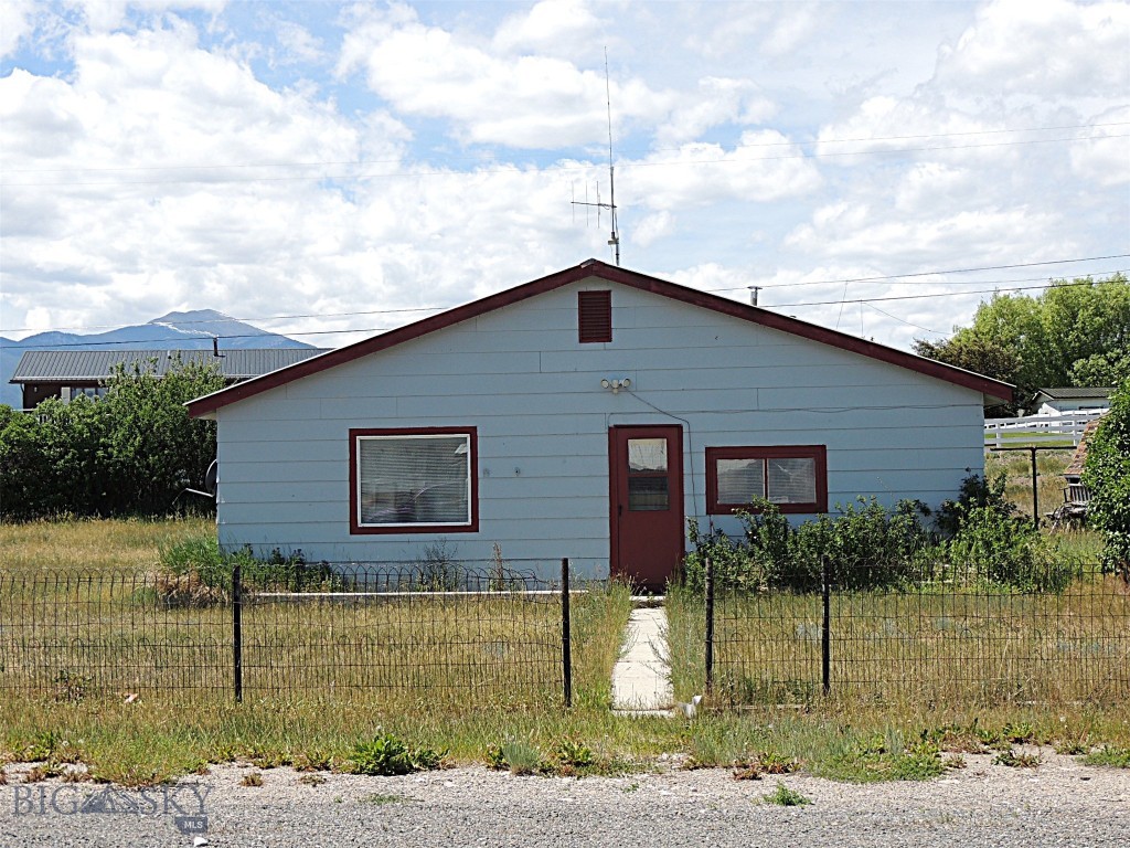 This property is on 0.45 acres and is waiting for a new owner to make it their own. The home was occupied until recently and is in working order. It offers 3 bedrooms and 1 bath with a laundry area. The kitchen is large and connects to the living room. The home is in the process of being emptied out. There is a 1977 Bonneville MH  on the property that has been used for storage, but was  hooked up to utilities at one time and with some work  could be livable again and used as a rental etc. Bring an offer; the seller wants this sold.
