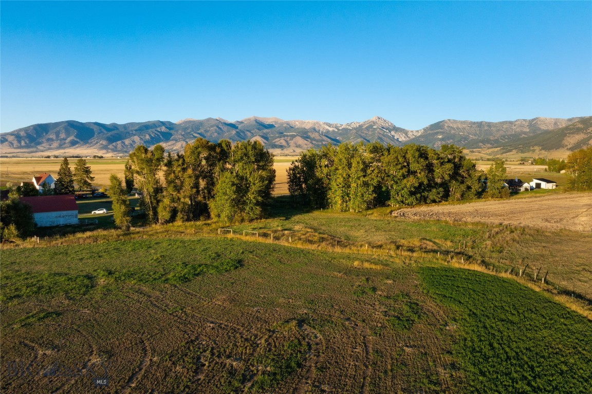Experience the best of Montana living at Penwell Bridge Farm, a new offering where expansive views meet rural elegance. Perfectly positioned beside the renowned Amaltheia Organic Dairy, these 2.5 -3.5 acre parcels capture some of the most breathtaking scenery in the Gallatin Valley. The Bridger Mountains rise to the east while surrounding farmland and open skies frame the landscape to the west. It creates the perfect backdrop to build your dream home. Light covenants allow for multiple dwellings and rental opportunities of seven days or longer. Whether you’re seeking space or the freedom to build a truly custom retreat, Penwell Bridge Farm delivers. Just minutes from Bozeman, residents will enjoy easy access to dining, shopping, and recreation, while returning home each day to peace, views, and fresh country air. With Amaltheia’s CSA pick-up and seasonal U-Pick flowers right next door, local connection and natural beauty are quite literally part of the neighborhood. Don’t miss the opportunity to claim one of these one-of-a-kind homesites, where every sunrise over the Bridgers reminds you why you chose Montana.