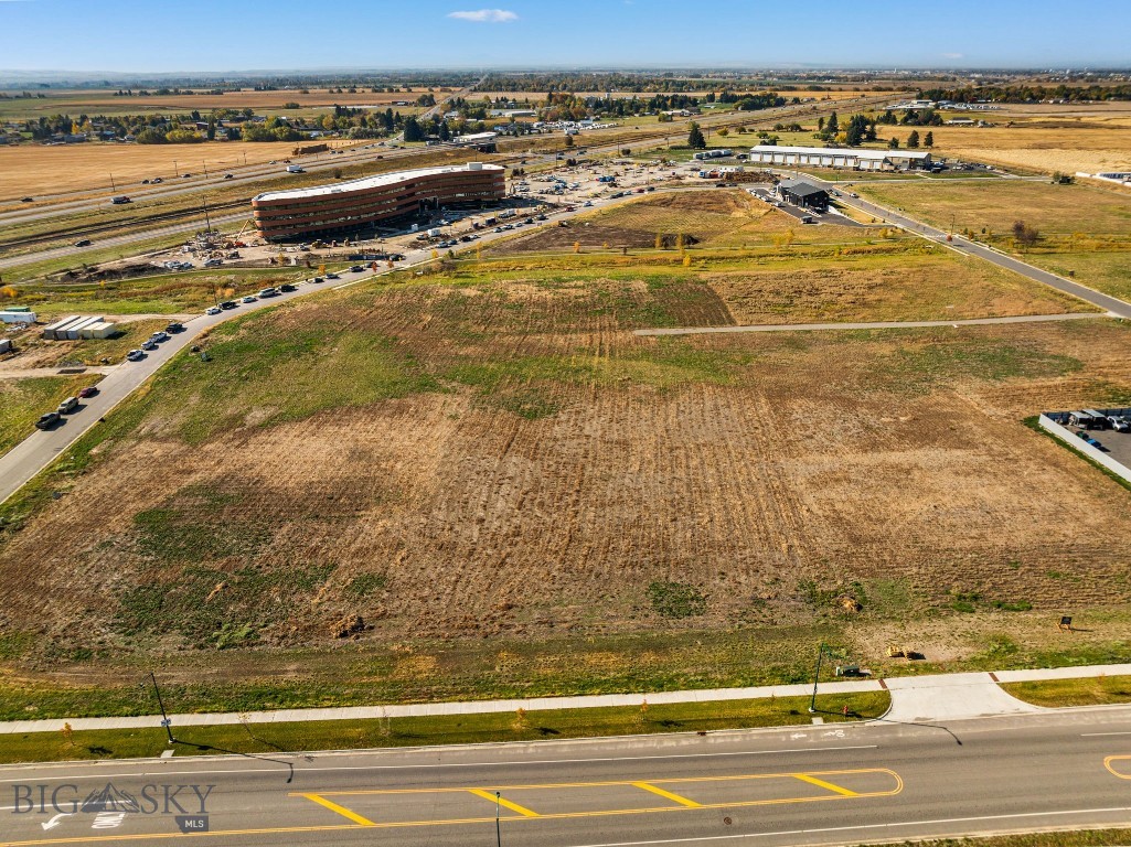 Large commercial lot in great location. There are building plans that may convey with the sale. Buyers & buyers agents to verify all information to their satisfaction.