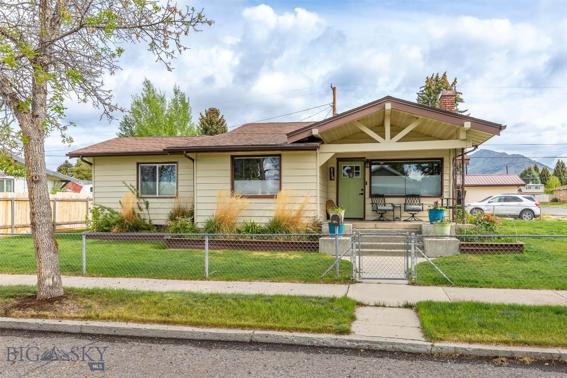 Charming and move-in ready, this 3-bedroom, 1-bath home offers space, character and opportunity! Situated on a generously sized fenced corner lot, the property features mature trees that provide shade and privacy, a welcoming front porch and a detached garage. Inside you will find comfortable living spaces and plenty of natural light. With its convenient location this home combines comfort, functionality, and room to grow!