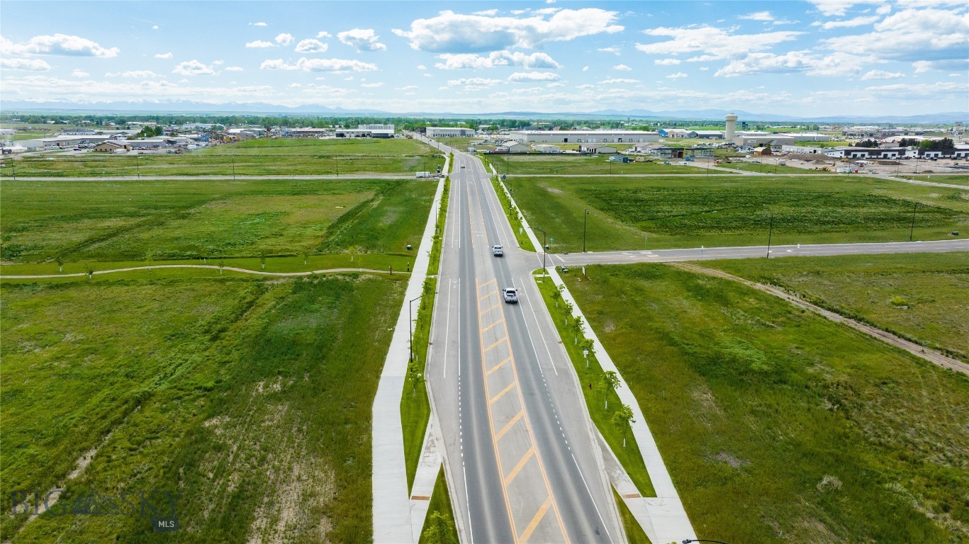 WEST POST is now offering commercial lots for sale at the I-90 Airport Interchange at Airway Boulevard and Frank Road in Belgrade, MT, just 6 miles west of Bozeman. The recently completed Frank Road will become the primary East/West connector to Jackrabbit Lane/US 191. This premier commercial development, with lots now under construction, is located within Belgrade City limits, providing all utilities and city services to the development. Phase 1 of WEST POST will have 36 lots and pad sites ranging from 0.7 to 6.2 acres, fully entitled for mixed-use development, with ideal sites for: hotels; restaurants; retail stores; offices; light industrial buildings; medical offices and many other uses. WEST POST is located less than a mile south of the Bozeman Yellowstone International Airport, and adjacent to the I-90 Interchange.  Block 2 Lot 9 has Frank Road frontage, and would be a great location for retail, restaurant, etc.