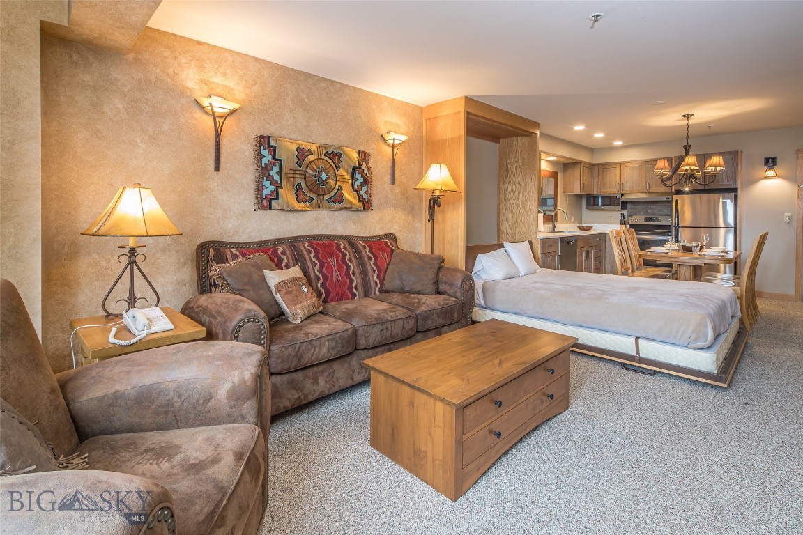 The Shoshone Hotel Condominiums are located at the base of Lone Mountain at The Big Sky Ski & Summer Resort. Unit 1964 is a 5 th floor unit having stunning views of the ski runs, and the Spanish peaks. The condo includes 1 bedroom plus murphy bed, 2 baths, full kitchen, dining area, living room with a fireplace. All amenities are available: fitness room, swimming pool, jacuzzi, concierge, room service, valets, restaurants, zipline events, & many other activities. An excellent rental history upon request, a great investment ready & waiting.
