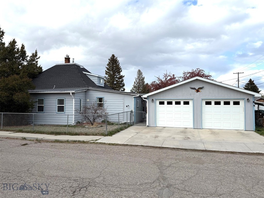 Great home, great location, great community! A lot has been done to this charming home in Dillon to make it a comfortable, dependable residence for years to come. Brand new roof on both the house and garage, new chimney spark arrester, new water valves, new carpet and padding upstairs and more! It has 3 spacious bedrooms, 2 bathrooms and a 2 car garage. A private, fenced yard to enjoy those warm summer evenings with mature landscaping and lots of room for storage. Plan your outdoor excursion from the comfort of this beauty located close to some of the best fishing, hunting, camping, horseback riding and ATV trails in Montana! When the school year starts this home is walking distance to UM Western and Beaverhead County High School. A great family home or a choice rental investment property. Call and learn more about all this location has to offer.