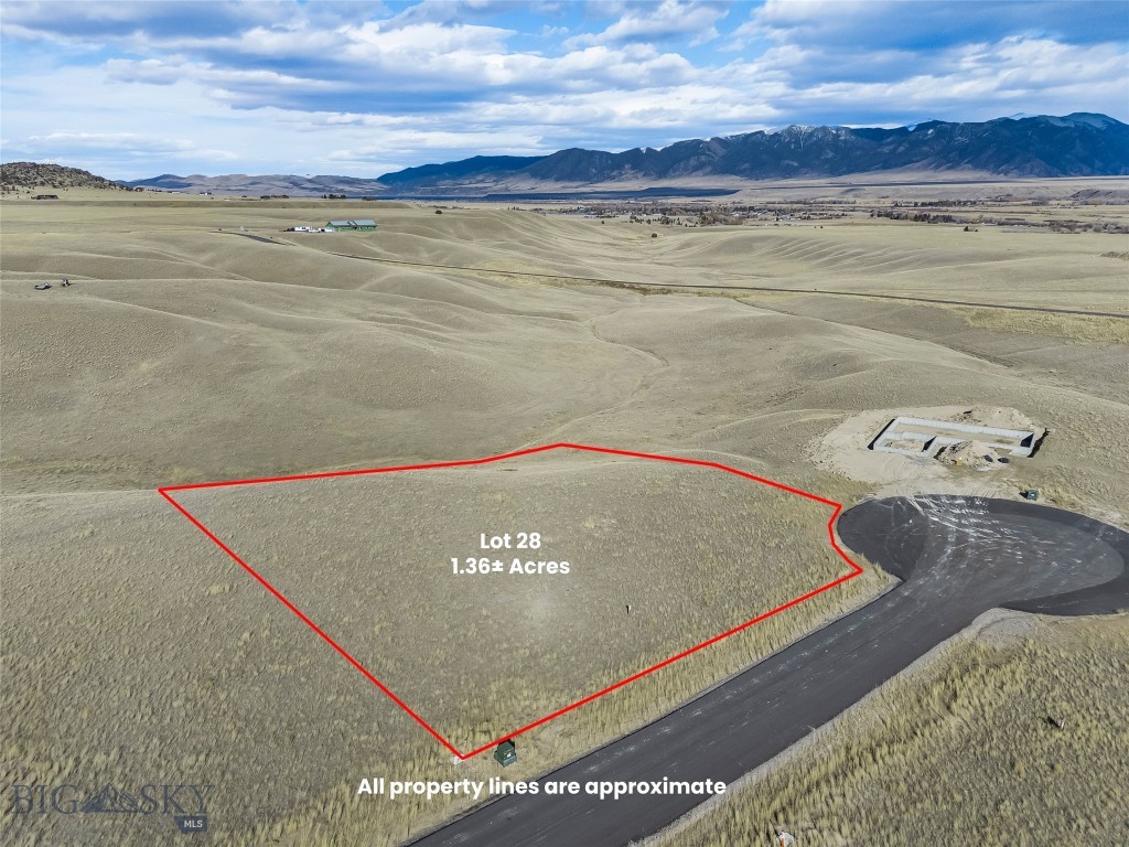 Lot 28 offers 1.36± acres within a thoughtfully planned 55-lot community, with parcels ranging from approximately 1 to 2 acres. The subdivision spans 165± acres total, providing generous open space and excellent opportunities to enjoy local wildlife. Paved roads are in place, with mailboxes, power, and fiber optic service to each lot. Located approximately three miles from downtown Ennis, this property offers sweeping views in all directions and convenient access to town amenities. Wells throughout the subdivision range from approximately 200 to 350 feet in depth, producing 12 to 60± GPM. The licensed Montana listing agent is a member of the selling entity.