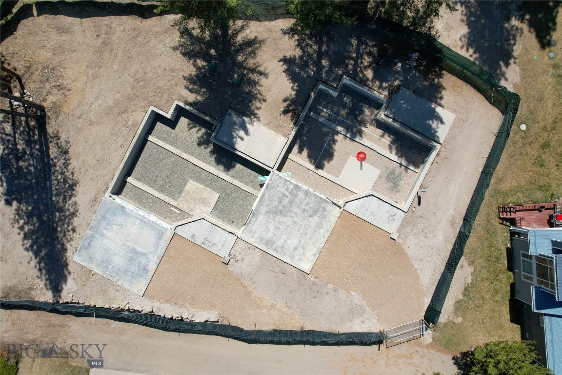 Less than 10 minutes from Helena and located in the welcoming town of Montana City, this new construction condo sits in a 55+ community where nature and convenience meet. The 1,752 sqft layout offers main-floor living with 2 bedrooms, 2.5 bathrooms, quartz countertops, and a smart, open floor plan. Wide hallways, grab bars, and a zero-entry shower in the primary suite make it accessible and easy to navigate. Built with your health in mind, the home includes a whole-house water filtration system and a heat recovery ventilator that helps remove allergens like pollen and smog. Outside, explore private walking trails, relax by the pond, follow the banks of Prickly Pear Creek, or catch up with neighbors at the clubhouse. Thoughtful covenants help maintain the peaceful setting, and you can even tailor the finishes to match your style. Schedule a showing today! Home is currently under construction - all interior photos are of the Model Home, not of this unit. Final Colors/Finishes may vary.