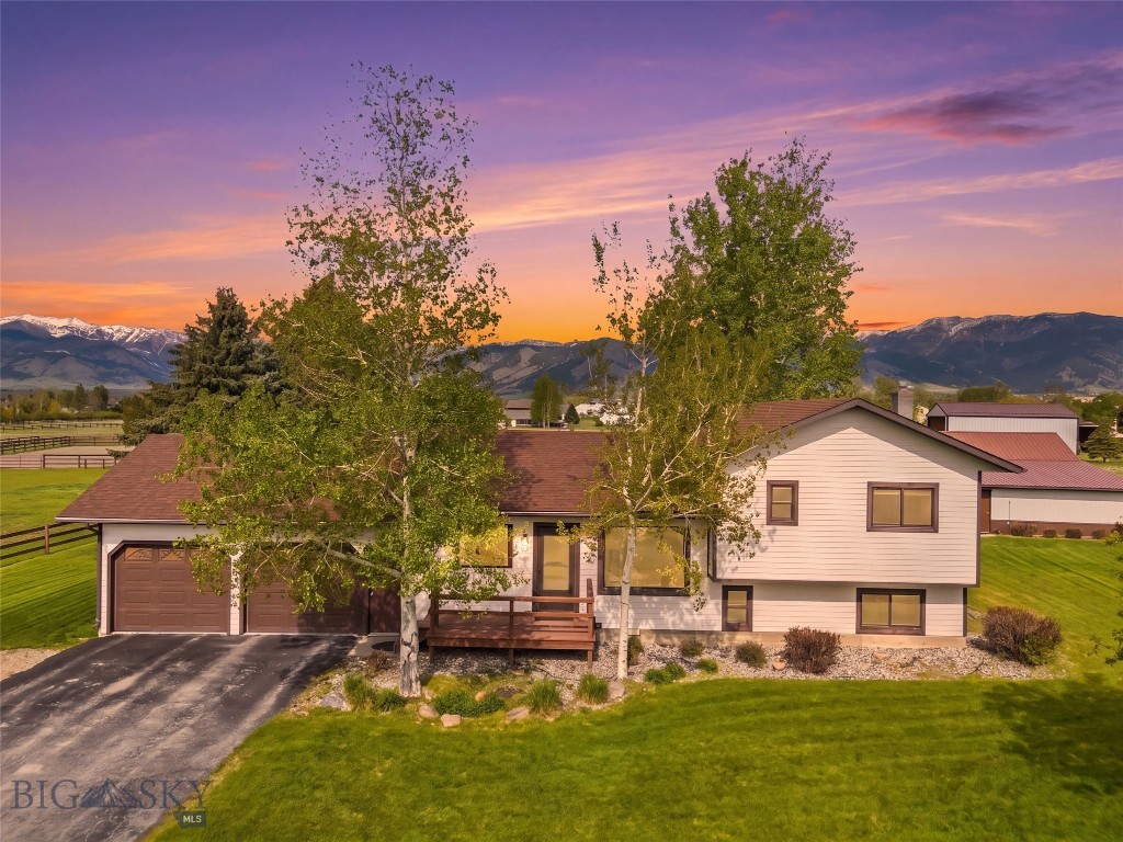 Experience breathtaking views and serenity just outside Bozeman, Montana. This stunning oasis is less than a quarter mile from exclusive river access for Outlaw Subdivision residents—ideal for premier fishing and outdoor exploration—and is only about 10 minutes from Gallatin International Airport. Nestled on approximately three acres, the property features a loafing shed, hay barn, shop with tack room, and a fenced riding area for horses. The extensively renovated 3-bedroom, 2-bath home reflects years of care and pride in ownership, offering inviting living spaces both inside and out. Enjoy sweeping views of the Bridger Mountains from your private backyard retreat. With ample space for future expansion and generous outdoor parking for trailers and recreational gear, this property supports the ultimate Montana lifestyle. Move in ready, this home awaits its next owner. Don’t miss your chance—schedule a showing and make this exceptional property yours today!