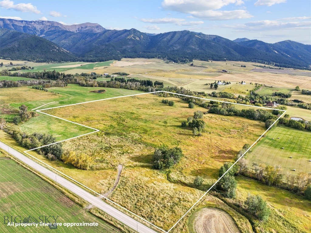 Live, Spring-Fed Mountain Creek! Discover the perfect slice of nature with just under 50 acres of lush meadow land on Ross Creek, in the Bridger Mountains. This property is a true Montana dream, teeming with abundant wildlife (Moose, Elk, Deer, Bear, Fox, Coyotes, Sandhill Cranes, Pheasants and Grouse). and offering spectacular mountain views that will take your breath away. The Bridger Mountains wrap around you on three sides, along with valley views of the Spanish Peaks and the Tobacco Roots. Situated on a quiet dead- end road, this land provides a serene and private setting, ideal for those seeking peace and tranquility. It's also conveniently close to forest service accesses, allowing for endless outdoor adventures. Truman Gulch and Corbly Gulch within 10 minutes away. Located in a welcoming ranching community of Springhill Community, just outside of Bozeman and Belgrade, Montana, this property features a live mountain-fed creek across the South side of the property, and a year around spring fed stream across the North boundary of the land. Whether you're looking to build your dream home, start a ranch, put the land into conservation or simply invest in a beautiful piece of land, this property offers endless possibilities. Don't miss out on this rare opportunity to own a piece of one of the most beautiful properties, on live water, with a stunning natural setting in the Gallatin Valley. Springhill Zoning in place to protect the open spaces, agriculture, land conservation and wildlife corridors.