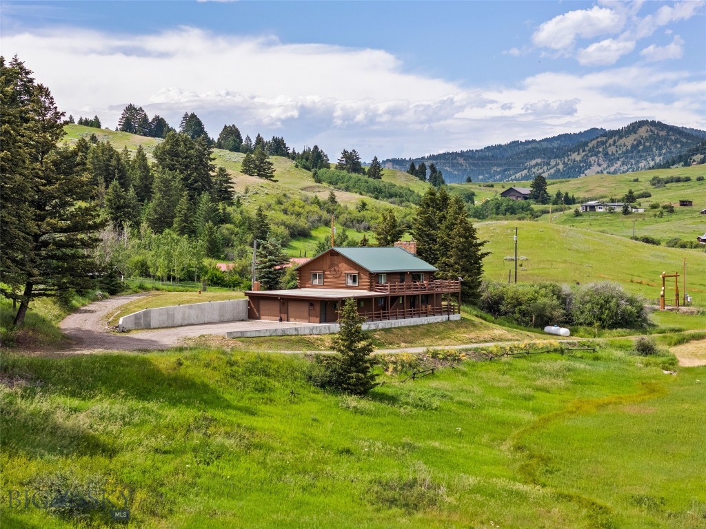 Well-maintained 4-bedroom, 2-bathroom home on 12+ acres just 11 miles east of Bozeman and Montana State University. This property offers a strong combination of space, usability, and location with light covenants in place to help protect the land and creek while still allowing flexibility.
The home features a functional layout with room to expand, making it a solid option for buyers looking to add value over time. A wraparound porch provides practical outdoor living space and takes full advantage of the open valley and Absaroka Range views.
The acreage is well-suited for a variety of uses, whether you're looking for privacy, small-scale agriculture, or additional outbuildings. Easy access to town while maintaining a rural setting makes this a competitive offering in the Bozeman market.