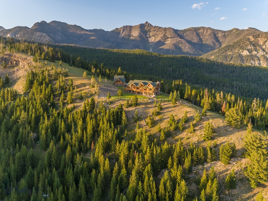 Spanning an extraordinary 491± acres in the heart of Big Sky, this private mountain retreat is one of the region