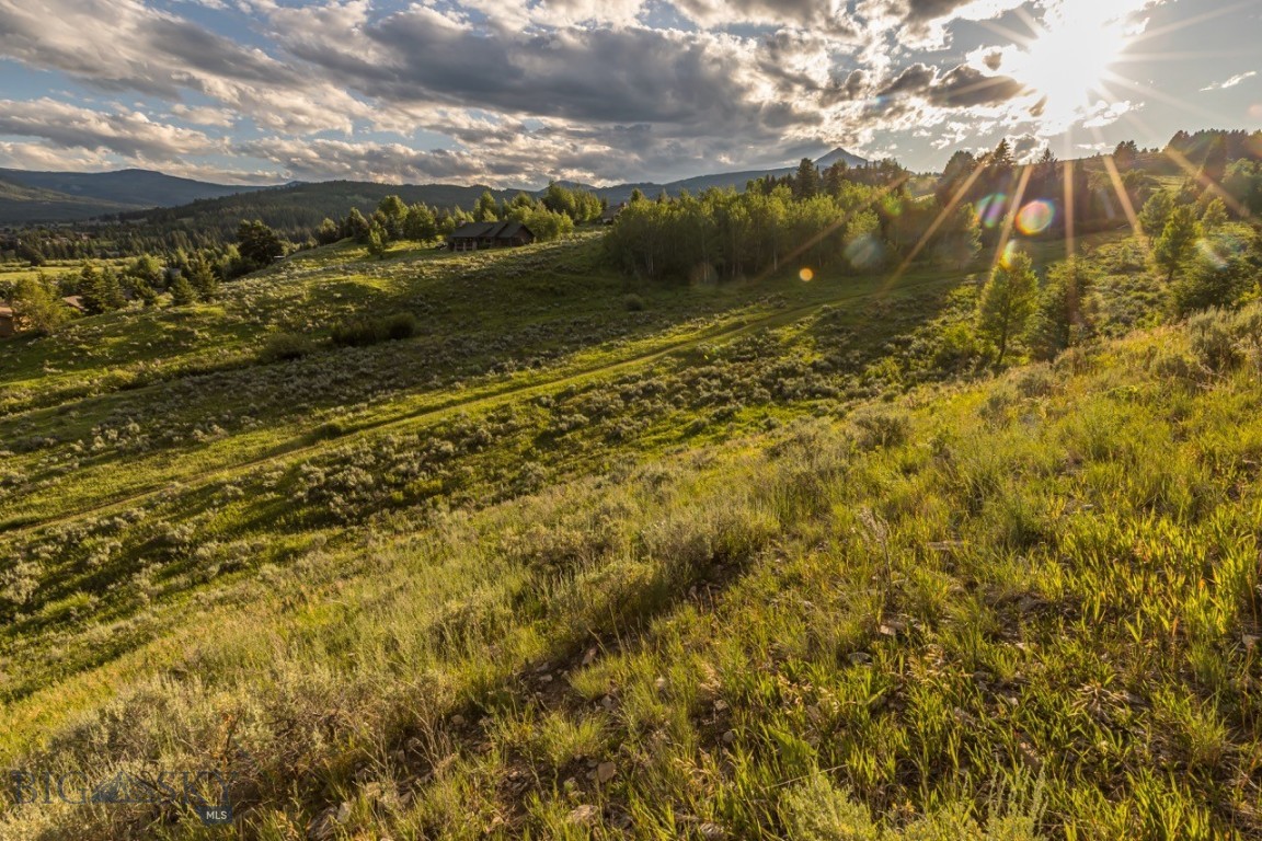 Build Your Vision in the Heart of Big Sky. An exceptional opportunity to create your mountain retreat in one of Big Sky’s most established neighborhoods. Nestled in the scenic the Big Sky Meadow Village, this stunning homesite offers commanding mountain views and seamless access to the area’s premier amenities and outdoor recreation.

From this beautiful homesite, you're just a short walk from expansive hiking and biking trails, the Big Sky Resort Golf Course, and the growing Meadow Village and Town Center—home to shops, restaurants, markets, and year-round community events. Whether you’re envisioning a peaceful getaway or an active, four-season basecamp, this property offers both flexibility and inspiration to bring your dream home to life.

Adventure continues just minutes away with world-class skiing and snowboarding at Big Sky Resort, Nordic trails at Lone Mountain Ranch, and blue-ribbon fly fishing on the Gallatin River. Within an hour’s drive, enjoy the cultural offerings of downtown Bozeman or explore the legendary beauty of Yellowstone National Park.

With its unbeatable location, opportunity for panoramic views, and access to all that Big Sky has to offer, Little Coyote Lot 30 presents a rare opportunity to build a custom residence in a setting that truly embodies the best of mountain living.