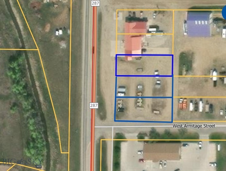 Location, Location, Location! This commercial property is comprised of 6 lots with direct HWY 287 frontage and next to the Ennis post office.  High traffic count and great exposure for your new venture!  City water and sewer services and electricity are directly behind the property in the alley.  Zoned commercial/industrial and the seller has a conditional use permit allowing mixed use- first level commercial with second level residential, offering potential for live/work units.  Easy access off HWY 287 and Armitage street and alley access to the rear. Seller is a licensed real estate agent in MT.