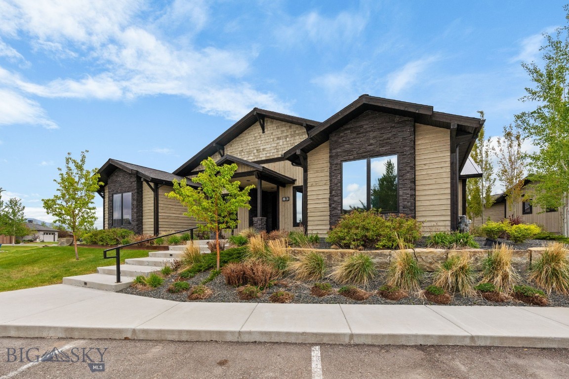 Tucked within the sought-after Black Bull Golf Community, this 1-bedroom, 1-bath Cottage offers an ideal blend of comfort, functionality, and lock-and-leave convenience. The thoughtfully designed kitchen and living area create an efficient, open layout perfect for everyday living or a Montana retreat. The spacious bathroom is beautifully appointed with dual sinks, a freestanding soaking tub, walk-in tile shower, under-cabinet lighting, and backlit mirrors for a spa-like feel. The oversized bedroom provides ample space for a home office, reading nook, or fitness equipment, while generous closets throughout offer exceptional storage. An in-unit washer and dryer add everyday ease. Located just steps from Black Bull amenities, including the championship golf course, fitness center, pool, private restaurant, and trails, this condo is an exceptional opportunity for low-maintenance living in one of Bozeman’s premier golf communities.