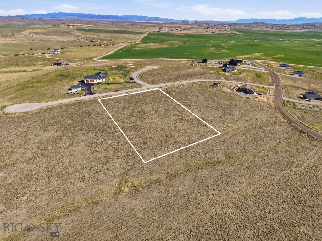 Discover 1.61 acres of prime building land in the desirable Westside Trails subdivision of Three Forks, Montana. This gently sloped parcel offers a peaceful, rural setting with easy access to local amenities and regional recreation. Ideal for a custom home, a quiet weekend retreat, or an investment holding, the lot provides ample space for a variety of site plans with room for outbuildings or landscaping.