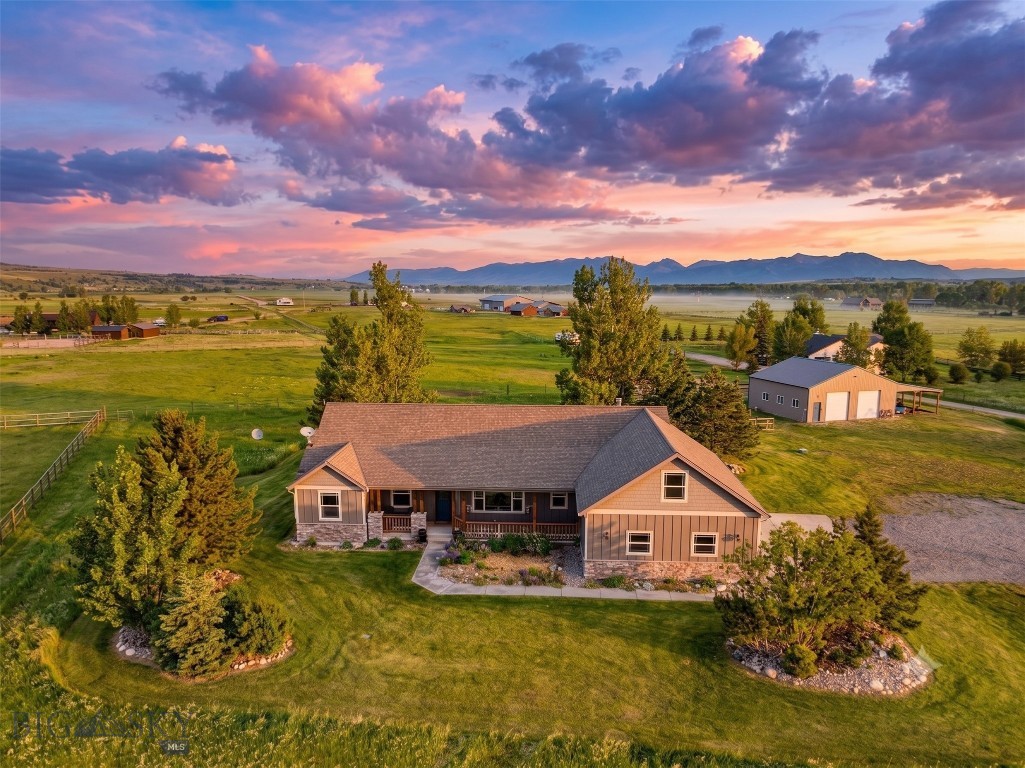 Welcome to 1721 Gateway South Road—an exceptional opportunity to own 5 acres in the heart of Gallatin Gateway, perfectly positioned between Bozeman and Big Sky. This outstanding horse property offers privacy, functionality, breathtaking mountain views, & unmatched access to some of Southwest Montana's most sought-after outdoor recreation.

The 2,541± SF home features 3 bedrooms, 2.5 baths, large 2nd level bonus room, air-conditioning, engineered European oak wood flooring, hot tub, & spacious 3-car garage. Large windows fill the home with natural light while showcasing unobstructed Bridger Mountain views to the north and dramatic Spanish Peaks views to the south.

Equestrian and hobby farm enthusiasts will appreciate the 30' x 40' shop with lean-to, exterior horse stall, dry lot, outdoor riding area, round pen, chicken coop, approximately 3 acres of fenced pasture, & valuable Noble Ditch water rights. Horses & livestock are welcome under light covenants, offering flexibility rarely found this close to town.

Located just 1.5 miles from Gallatin Gateway, you'll enjoy easy access to Stacey's Old Faithful Bar & Steakhouse, The Westerner, Gallatin Gateway School, & the Community Center. The Gallatin River is less than a 1/2 mile away, providing world-class fly fishing & endless recreation opportunities.

Outdoor enthusiasts will love the proximity to Little Bear National Forest Access, hundreds of acres of State Land, the Axtell-Anceny area, & Turner's Flying D Ranch conservation ranch. Hiking, horseback riding, hunting, fishing, wildlife (elk & bison), & year-round adventure are right outside your door.

Despite its peaceful country setting, the property is conveniently located just 13 miles to Bozeman, 13 miles to Belgrade, 16 miles to Bozeman Yellowstone Int'l Airport and Spanish Creek Trailhead, 21 miles to Hyalite Reservoir, 28 miles to Big Sky Resort, & 32 miles to Bridger Bowl.

Properties offering this combination of acreage, water rights, equestrian infrastructure, mountain views, recreation, & proximity to both Bozeman & Big Sky are increasingly difficult to find. Whether you're seeking a horse property, hobby farm, recreational basecamp, or simply a place to enjoy Montana's unmatched beauty and lifestyle, 1721 Gateway South Road delivers a truly special opportunity where mornings begin with mountain views, afternoons can be spent riding, fishing, or exploring public lands, and evenings end under Montana's legendary big sky.