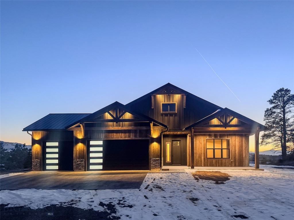 Brand New Custom Construction on 2.72 private acres in Canyon Ferry Crossing with panoramic mountain and valley views. This stunning 2,107 sq ft home offers 4 bedrooms, 3.5 baths, including 2 primary suites, all bedrooms have walk in closets!  Exceptional craftsmanship including Amish hewn beams and exposed timber trusses.The gourmet kitchen features a massive granite island, with seating, extensive granite counters, shaker cabinetry, GE Profile stainless appliances with oven-microwave combo, gas cooktop, beverage/wine fridge, standalone ice maker, and wet bar sink, walk in pantry, kitchen open to the vaulted great room with dramatic black accent wall and modern fireplace. Spa-like master bath includes a frameless glass tiled shower, separate tub, dual granite vanities. Oversized custom walk-in closet with built-ins. 2 master suites provide flexible living options. Additional highlights: barn wood-like exterior with exposed timber trusses, 8' doors throughout, metal roof, granite counters in all bathrooms & and laundry sink. Detached 24x32 finished shop/garage with matching exterior — ideal for storage, hobbies, or toys plus Attached heated 3 car garage. Large concrete slab wired for spa outside primary bedroom exterior door.
Easy access to Canyon Ferry Lake recreation.