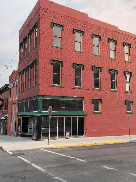 11,732+sf commercial building composed of 3 floors and a basement. Roof was installed a couple years ago. Property is zoned C3. The building elevator was last utilized in 1981. Great window display space with original shelves on main floor behind the walls, 2nd and 3rd floor offer original woodwork, most windows with weights and pulleys, working transoms. Front entrance for retail on N. Main street side and potential apartments/office accessed off the W. Granite entrance. Potential buyers to do their due diligence. Note the upper floors were last occupied in the 1970s. The property is within the URA District with renovation grants possible. The property is within the Butte Opportunity Zone.