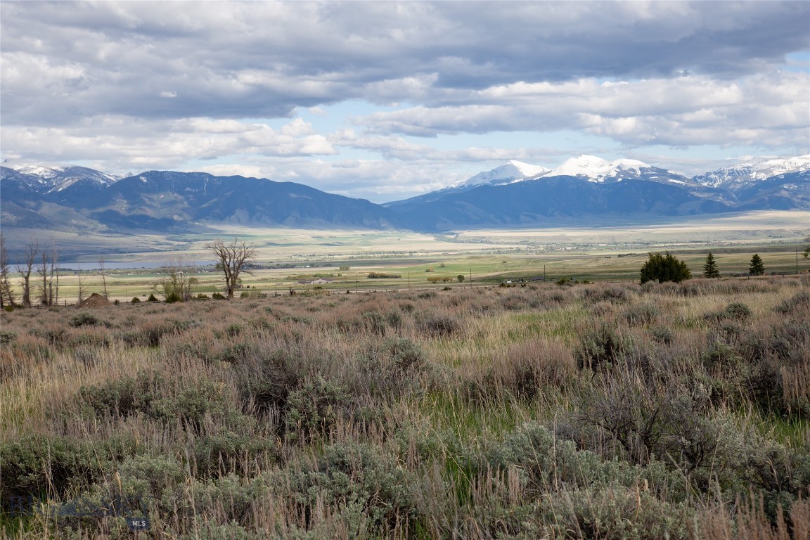 Lot 5 in Wey’s View offers 5 acres in the highly desirable South Meadow Creek area of McAllister, Montana. A year-round creek runs along the north boundary of the property, creating a peaceful setting accented by aspens, junipers, and willows. Moose and deer are frequent visitors to the lush creek corridor.
With no covenants, this lot provides outstanding flexibility for a full-time residence, vacation home, or investment opportunity. The views are truly exceptional—South Baldy in the Tobacco Root Mountains, Ennis Lake, the Madison Range, and Lone Mountain are all visible from the property.
Less than a mile from National Forest access, the location is perfect for outdoor enthusiasts. Ennis is just 15 minutes away, and Bozeman is under an hour's drive for work, travel, or amenities. Ennis Lake and the Madison River are both close by, offering easy access to fishing, boating, and recreation.
This is a rare chance to own property in one of Madison County’s most scenic and sought-after areas.