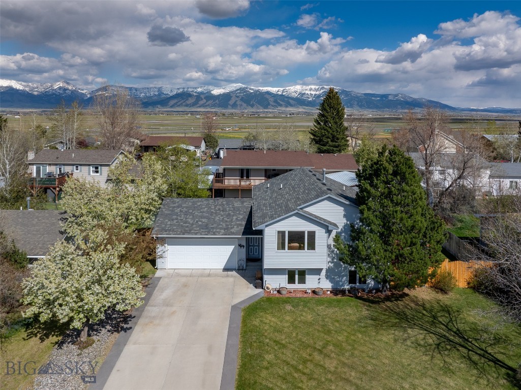 Some homes simply feel right the moment you walk in — this is one of them. Lovingly maintained by its original owners, this exceptional 4-bedroom, 2-bath split-level home radiates pride, quality, and care.

Every inch of its 2,183 square feet has been thoughtfully maintained, creating a sense of lasting value. Natural light fills the home, and the layout flows easily from room to room. Spacious bedrooms, including some with walk-in closets, offer plenty of room to unwind. The remodeled kitchen is bright and inviting. Two comfortable living rooms give everyone space to spread out, and the generous laundry room adds convenience and storage.

Outside, the fenced yard and newer deck are ready for summer gatherings, and the underground sprinklers make lawn care effortless. The major updates are already done — the roof, furnace, water heater, and more — so there’s no need to worry about big expenses or projects. The attached two-car garage provides secure parking, extra storage, and easy access year-round. 

This home is truly move-in ready, offering years of low-maintenance living and peace of mind.