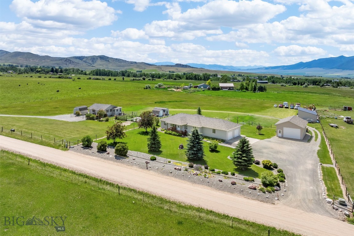 If you’re looking for a place where you can actually hear yourself think, this is it. We’re on 5 acres just outside Sheridan—less than five minutes from Main Street, but far enough out that you don't have to worry about anyone telling you what to do with your land. With no covenants, you’ve got the freedom that makes the Ruby Valley worth it. The main house is a solid 1,500 sq. ft. with 3 beds and 2 baths, plus an attached two-car garage. For the projects, there’s a detached shop and a massive carport that’ll keep three more vehicles or your toys out of the Montana weather.

What really sets this one apart is the fully detached mother-in-law home. It’s 1,152 total sq. ft. across two levels, complete with its own kitchen, laundry, and living space. Whether you need a spot for family, a rental, or a high-end home office, it’s ready to go. Five acres gives you plenty of elbow room without being a full-time job, and Sheridan is that rare town that still feels quiet and authentic.