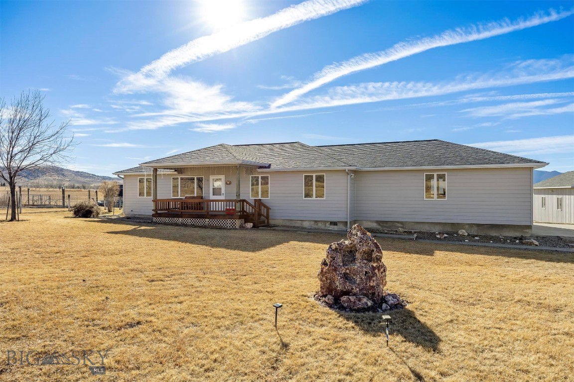 If you’re looking for a place where you can actually hear yourself think, this is it. We’re on 5 acres just outside Sheridan—less than five minutes from Main Street, but far enough out that you don't have to worry about anyone telling you what to do with your land. With no covenants, you’ve got the freedom that makes the Ruby Valley worth it. The main house is a solid 1,500 sq. ft. with 3 beds and 2 baths, plus an attached two-car garage. For the projects, there’s a detached shop and a massive carport that’ll keep three more vehicles or your toys out of the Montana weather.

What really sets this one apart is the fully detached mother-in-law home. It’s 1,152 total sq. ft. across two levels, complete with its own kitchen, laundry, and living space. Whether you need a spot for family, a rental, or a high-end home office, it’s ready to go. Five acres gives you plenty of elbow room without being a full-time job, and Sheridan is that rare town that still feels quiet and authentic.