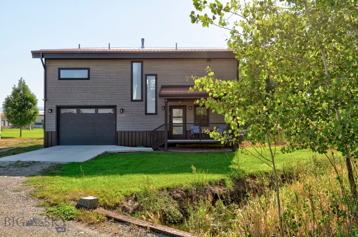Enjoy this fabulous custom-built home that offers small-town living just minutes from world-class fishing. This property truly has it all!

The main level features two bedrooms, a full bath, and a laundry room. The second level boasts a huge master suite with a wall of windows, an amazing bathroom, and a large walk-in closet.

The great room is a highlight, with a gorgeous centerpiece fireplace perfect for cozy nights. The well-appointed kitchen includes a walk-in pantry, a gas range, and ample counter space and a half bath for guests. This main level also features walls of windows and an expansive deck, ideal for enjoying morning coffee and views of the surrounding mountains.

Situated on a quiet 3/4-acre lot, there's plenty of room to add a shop or a garden, allowing you to truly make it your own.