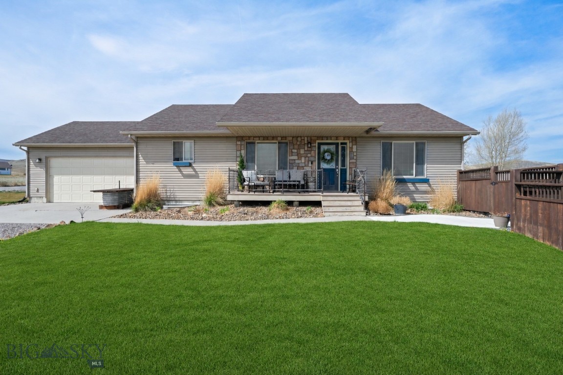 Welcome to 338 Expedition Drive, where wide-open skies and stunning mountain views surround you in peaceful rural comfort. This beautiful 4-bedroom, 3-bath home combines Montana’s natural beauty with thoughtful modern touches.  Step inside to find a warm and inviting kitchen featuring beautiful cherry cabinets and plenty of space for cooking and gathering. The open layout flows into a bright living space with windows that frame the spectacular mountain scenery. Downstairs, a spacious family room with a dry bar offers the perfect spot for entertaining or relaxing on cozy evenings. Outside, your yard opens onto acres of private, undeveloped land, offering privacy, serenity, and endless opportunity for outdoor enjoyment.  This property is ideal for those who love to live close to nature — with a greenhouse for homegrown vegetables and flowers, a saltwater hot tub for unwinding under the stars, and an underground sprinkler system with drip line to keep the yard lush and vibrant.
Practical comforts include power through Vigilante Electric Cooperative, known for affordable energy rates compared to other areas in Montana. Outdoor enthusiasts will love being near the Beaverhead and Big Hole Rivers, both famous for exceptional fishing, as well as miles of hiking trails leading to pristine mountain lakes. 
This is more than a home — it’s a Montana lifestyle. Expansive views, rural charm, and modern convenience all come together at 338 Expedition Drive.