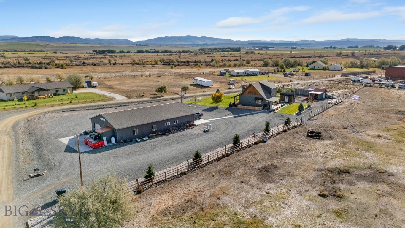 If you’ve been dreaming of wide-open skies, workshop space, and mountain views from your porch — this is your Montana moment. Set on 10.02 acres in desirable Townsend, MT, this custom-crafted 3 bed, 3 bath home features 1,120 sq ft on the main level, plus a 308 sq ft Upstairs welcomes you with a cozy loft overlooking the living room, a charming guest room with mountain views, a home office filled with natural light, and a rustic full bath that ties it all together beautifully. Built in 2011 with timeless style, you’ll find granite counters, rich wood cabinetry, soaring ceilings, and a cozy wood stove. Enjoy year-round outdoor living on the covered porch with panoramic views. A 3-car garage offers a heated workshop and private guest quarters with its own bedroom, bath, and living space. With thoughtfully maintained grounds, outbuildings, and room to roam — Come for the views, stay for the lifestyle.