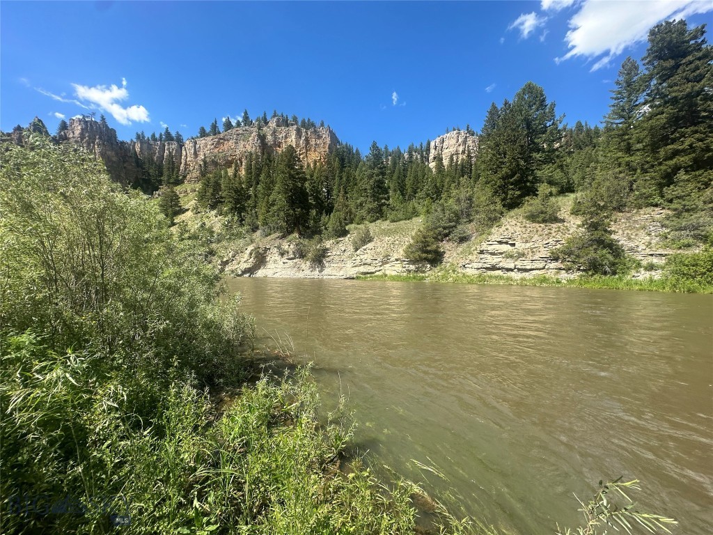 A truly rare offering: .287 riverfront acres on the legendary Smith River, and the only lot currently available in this sought-after subdivision. Wake up to stunning, unobstructed views of dramatic cliffs and surrounding mountains right from your doorstep. This is Smith River access at its finest — put in for one of Montana's most coveted floats just steps from your own property. Located approximately 30 minutes from White Sulphur Springs, this lot offers the rare combination of true riverfront frontage, jaw-dropping scenery, and privacy in a subdivision where opportunities like this rarely come available. Whether you're dreaming of a cabin getaway or a base camp for float season, Lot 16 delivers a setting that speaks for itself. Don't miss your chance to own on the Smith.