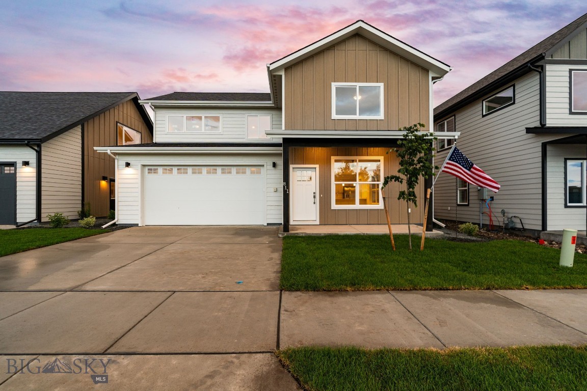 Welcome to West Post, the Gallatin Valley’s premier, vibrant master-planned community. Perfectly blending residential comfort with a bustling, walk-friendly vibe, this neighborhood is designed for effortless living. Boasting unmatched regional access, you are just half a mile from the Bozeman Yellowstone International Airport and minutes from I-90—making travel, commuting, or heading out for a mountain adventure incredibly seamless. This thoughtfully designed, two-story home offers the ideal balance of open gathering spaces and separation/privacy. Step into a bright, open floor plan where the kitchen, dining, and living areas flow together effortlessly—perfect for entertaining or daily family life. The main level also features a highly coveted main-floor bedroom, making it an ideal setup for a main-level primary suite, a private guest room, or a dedicated home office. Head upstairs to find three additional generously sized bedrooms and a full bathroom. It’s the ultimate layout for keeping family or guests comfortable and giving everyone their own space. Leave the car in the garage! West Post is uniquely designed to be a highly walkable, mixed-use hub featuring a dynamic mix of local businesses, future retail, and restaurants right at your doorstep.
