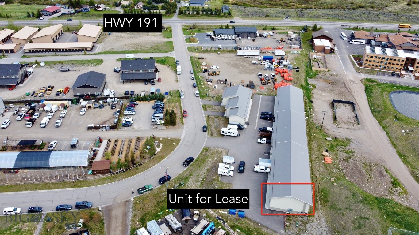 Versatile 1,418± square foot Big Sky warehouse available for lease for $2,500/month with easy access to HWY 191.  The space includes approximately 732 +/- square feet on the lower level and an additional 686 +/- square foot upper mezzanine, providing ample room for storage, inventory, equipment, and operational needs.
Features include heat, a utility sink with hot and cold water, multiple electrical outlets throughout, internet availability, and access to a shared restroom with shower. Ceiling heights are approximately 8 feet on the lower level and 6 feet 10 inches on the upper level. As an end unit, the space offers convenient access and added privacy.
Ideal for contractors, tradespeople, business storage, inventory management, hobby use, or other light commercial applications requiring a clean, functional, and well-equipped space.  These units don't come up for lease often, reach out today!