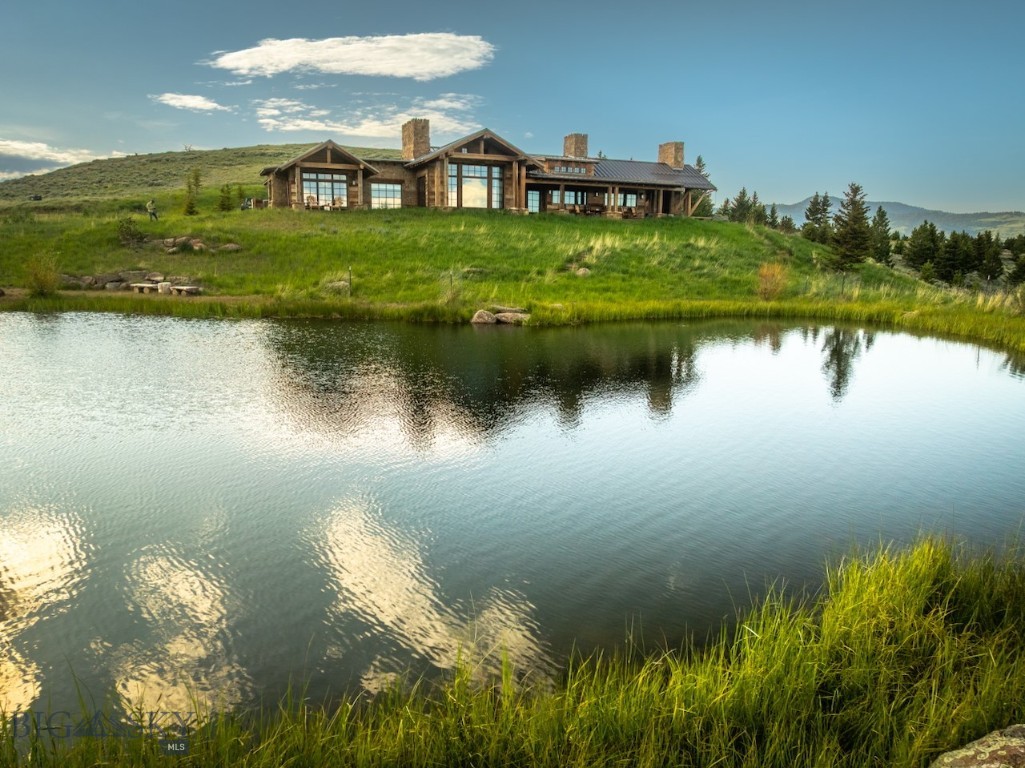 Big 5 Ranch is in Livingston, Montana, a distinguished western town noted for its hospitality, scenic beauty, and vibrant community committed to preserving the unique character of the region. With a population of approximately 9,000, Livingston serves as the original gateway to Yellowstone National Park. Big 5 Ranch is ideal for a family, corporate or hunting retreat and is minutes from downtown Livingston. 

The ranch spans 514 acres of timbered hillsides and grasslands, affording significant privacy while remaining within convenient reach of both downtown Livingston and Bozeman. Big 5 Ranch sustains a resident elk herd, whose numbers fluctuate but consistently benefit from the property's high-quality habitat, refuge, and forage, supporting both elk and deer populations. In addition, moose and other large wildlife species typical of the greater Yellowstone ecosystem are routinely observed on site. An extensive trail system offers numerous opportunities to observe and appreciate the diverse wildlife present throughout Big 5 Ranch.

Inspired by Montana’s historic homesteads, the ranch residence was designed to look like an established cabin that was expanded. There are intimate spaces within each room, so it does not feel too grand, keeping a cozy feeling throughout. The house blends into its hillside setting and is well-suited for two as it is for 10. Its aged look is paired with contemporary touches like black steel accents, angled columns, and sleek windows that frame landscape views. Reclaimed wood logs, granary timber, Douglas fir beams, Montana moss stone, and a metal roof all evoke a historic feel. No sheetrock was used; instead, reclaimed timber, hand applied plaster, and shiplap ensure comfort and style across. Modern elements like handmade tiles, French oak hardwoods add artistic flair, while rustic finishes reinforce the home's Western appeal. 

Big 5 feels extremely remote yet is accessible to world class amenities throughout this part of southwestern Montana.  This is an exceptional Montana lifestyle opportunity for outdoor enthusiasts with its expansive landscape, excellent location and combination of dramatic natural beauty, robust wildlife populations, and architectural brilliance.