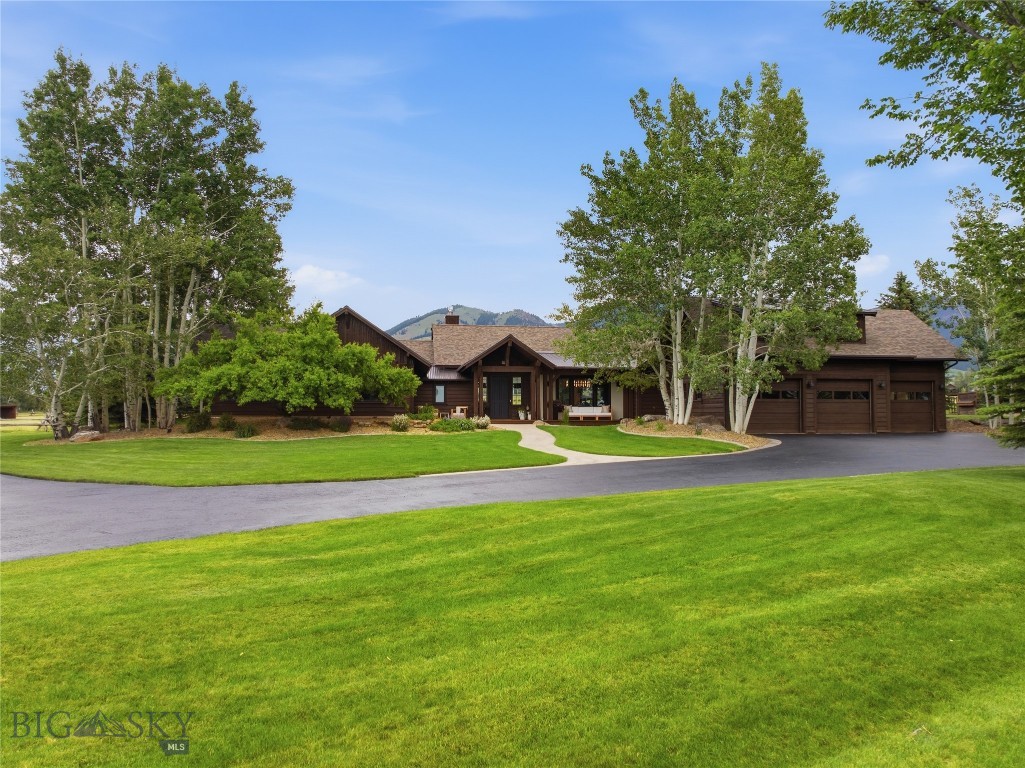 Framed by sweeping Bridger Mountain views and set on 11± acres, this exceptional property captures the essence of Montana living, where refined comfort meets wide-open space. Thoughtfully reimagined through an extensive renovation, the 4,345± square foot residence blends timeless design with modern finishes, creating warm, inviting spaces for everyday living and effortless entertaining. The beautifully appointed kitchen serves as the heart of the home, complemented by elegantly renovated bathrooms, custom interior finishes, updated lighting, new flooring, and an impressive stone fireplace anchoring the main living area. A wet bar, abundant storage, and an oversized epoxy-finished garage add style and functionality, while recent improvements, including a new roof, expansive outdoor living areas, air conditioning, and refreshed exterior finishes, provide peace of mind for years to come. Beyond the home, the property's versatility truly shines. A beautiful custom barn offers horse facilities, generous storage, and ample space for hobbies or recreation, while the finished two-bedroom apartment above provides comfortable accommodations for guests, extended family, or a caretaker. Whether enjoying sunrises over the Bridger Mountains from the patio, entertaining beneath Montana's endless skies, taking advantage of the property's convenient proximity to downtown Bozeman, world-class recreation, and the airport, this is a rare opportunity where luxury, functionality, and convenience come together in one extraordinary setting.