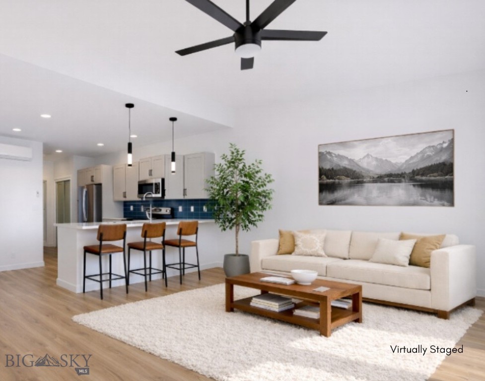 Located just over a mile from the Yellowstone River and on the east end of downtown Livingston, this fantastic  IronSide Lofts development offers exceptional flexibility with short-term, mid-term, and long-term rentals allowed per covenants and currently permitted in Livingston (including Airbnb use). These well-designed side-by-side units feature two bedrooms and two bathrooms, with carports and private storage closets conveniently located beneath the main living area. Inside, you’ll find generous kitchen space with soft close cabinets and a built in coffee bar, walk-in closets in both bedrooms, and efficient mini-split heating and cooling units in the main living areas. Southern exposure fills the home with natural light while showcasing beautiful views of the Absaroka Range. Enjoy close proximity to downtown Livingston, the bridge, trail systems, Neptune Brewery, coffee shops, restaurants, and the Livingston Billings Clinic, as well as quick access to the rodeo grounds—making it easy to attend events without the hassle of parking.