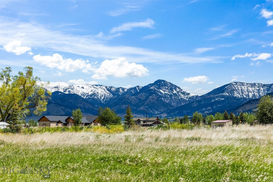 Great opportunity to build your dream home in the minor subdivision of Cottonwood Creek.  This lovely parcel is in the lush Springhill area, home to gorgeous ranches, farms and neighborhoods.  The rural feeling community is but minutes to town, however, you will feel miles and miles away. It's just north of the high end Bridger Lakes Meadows development. There are views of the surrounding mountains and big skies.  The covenants are light but protective.  Gorgeous homes are nearby promoting the property values.  Covenants allow for a single family home and an outbuilding/shop.  This rural, horse friendly community awaits a new home owner.  Bonus...this Seller is a custom home builder should you need some help!