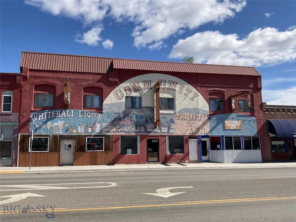 Discover a rare mixed-use investment opportunity at 113 W. Legion in the heart of Whitehall. This versatile commercial property offers multiple streams of income with loads of future potential. The main floor is currently occupied by a well-established liquor store, a pawn shop, and a gym that provides steady monthly rental income. The pawn shop is owner-operated, giving a buyer the flexibility to continue the business, expand the liquor store, or convert the space into an additional income-producing rental. Upstairs features four residential apartments, with three currently occupied and one undergoing renovations to prepare for future rental income. Outside, a detached garage offers additional income potential or storage opportunities. The property also includes ample parking, adding convenience for both tenants and customers.  Whether you are looking for a strong investment property, a business opportunity, or a building with value-add potential, this downtown Whitehall property offers flexibility, visibility, and long-term upside. Ideal for a 1031 exchange, investor portfolio, or entrepreneur seeking a prime location.
