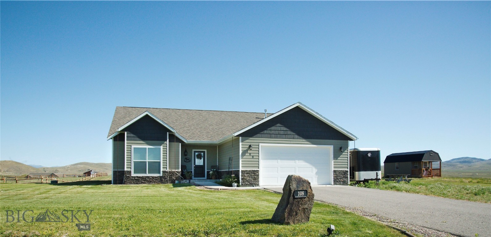 Welcome to 108 Rolling Prairie Way, located just outside of Three Forks. This beautiful home sits on 1.41 acres and features 3 beds/2 baths and offers nearly 2,000 square feet of thoughtfully designed single-level living. The home is located in the very desirable Village at Elk Ridge Subdivision featuring fully paved roads throughout. 

Built in 2019, this open-concept floor plan seamlessly connects the kitchen, dining, and living area, creating an ideal space for everyday living and entertaining. The spacious living room features a cozy gas fireplace and large picture window that fills the home with natural light and offers a great view to enjoy! 

The well-appointed kitchen includes soft-close cabinetry, dark stainless steel appliances, a gas range, reverse osmosis water system, and a dedicated pantry for added storage. The primary suite provides a relaxing retreat with private deck access, a soaking tub, tiled shower, and a large walk-in closet.

Additional features include a water softener, underground sprinklers, and an attached two-car garage. Outside, enjoy surrounding views of rolling hills, farmland, and watch the sunset from the back deck or covered patio. The property also offers an RV pad with water and power hookups, along with a large storage shed for added versatility. Check out the virtual tour to get a more detailed look at the home!

Conveniently situated between Bozeman and Helena, this property combines peaceful country living with easy access to modern amenities. Experience the space, comfort, and scenery you've been searching for! Also enjoy the benefits of the Village at Elk Ridge Subdivision featuring a large park area that includes sitting benches, baseball and soccer fields, a basketball court, and a covered gazebo with multiple picnic tables and BBQ grills. Call today to schedule a showing!