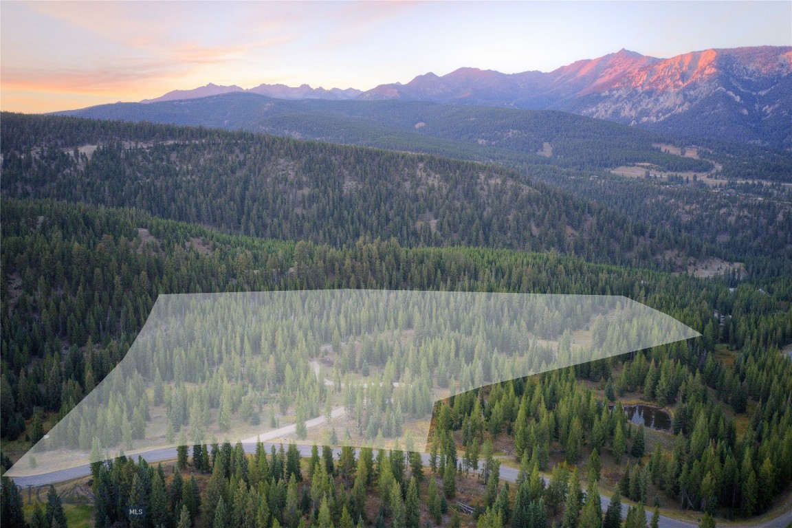 You don't want to miss this. This is an incredible 25.07 acre Spring Creek Reserve Ranch lot in Spanish Peaks Mountain Club with an additional 20+ Acres of open land (never to be built on) adjacent to it. This is an amazing opportunity to create a Legacy property with a House, Guest House and a Barn. This property has stunning views of the Spanish Peaks, has natural pond and a stream, lush open meadows, and is approximately 2 miles to the Montage Hotel, SP Clubhouse and Town Center. Enjoy world class amenities including a signature Tom Weiskopf 18 hole golf course, Tom's Ten golf course, Aspire that is coming soon, private ski access and the restaurants, bars, spa, bowling alley, within the Spanish Peaks Clubhouse and Montage. An opportunity for Golf or Ski Social Membership with an approval and the funding of membership is due not later than closing on property. Please be aware that the railing has fallen off the view stand. I would advise not using the view stand until it is repaired. Thank you for showing this amazing property.