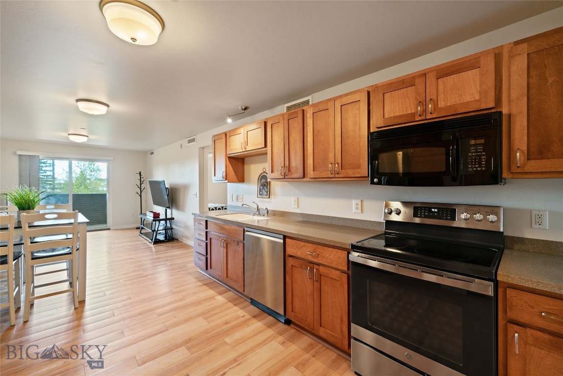 SELLER IS OFFERING A $5,000 CLOSING CREDIT TO THE BUYER!!!

Welcome to this well-maintained 2-bedroom, 1.5-bath condo, ready for its new owners. Ideally located near Town & Country, Sidewinders, and Ferguson Farms, this home offers excellent walkability, making everyday living convenient and enjoyable. You’ll also appreciate the close proximity to Montana State University, outdoor recreation, and all that Bozeman has to offer.

Situated on the first floor, the unit features a private patio that opens to shared green space—perfect for relaxing or easy access for dog owners. Inside, you’ll find a clean, efficient layout designed for low-maintenance living, complete with in-unit washer and dryer.

This property is ideal for those seeking a “lock-and-leave” lifestyle. A dedicated covered parking space is included.

Monthly HOA dues cover garbage, water, sewer, exterior maintenance, lawn care, snow removal, and exterior insurance—providing peace of mind and simplified living.
BONUS: This condo development is VA approved, a rare opportunity in Bozeman at this price point.
