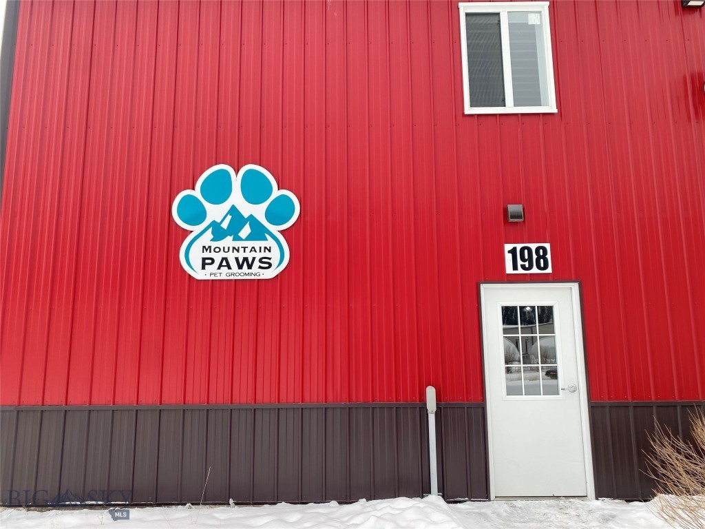 Perfect warehouse space in Big Sky for business or personal use. 1) 1920 ft.² 2) Two 14 ft overhead garage doors on back side, 1 man door in front, 1 man door on south side 3) 500 square foot office/workspace, hot and cold water, private bathroom 4) 2-year Lease in place for the office/workspace 5) storage space located above office/workspace 6) propane heat 7) space for a loft or second floor