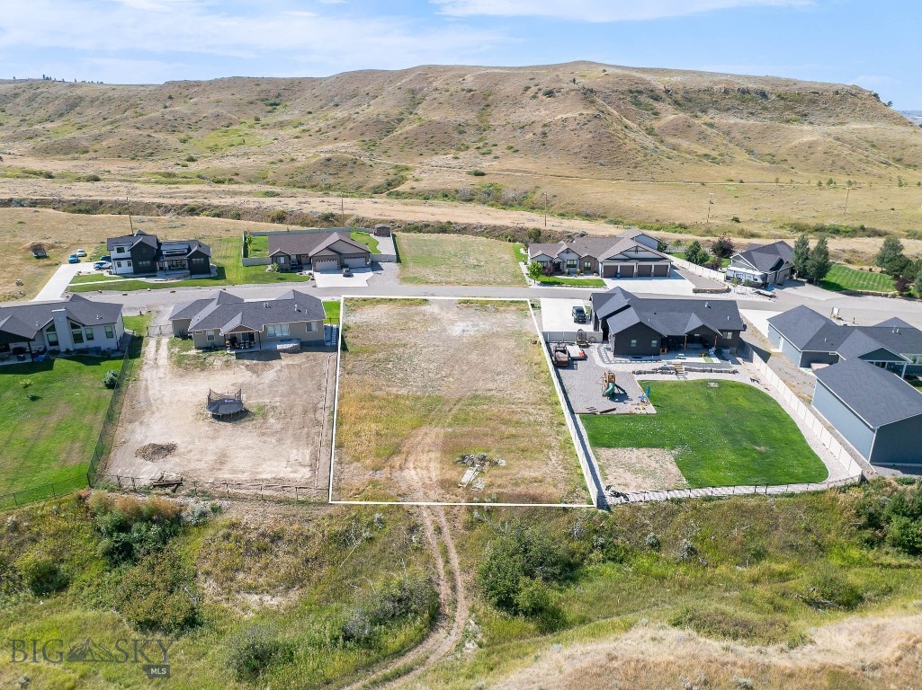 Prime lot available in Sanctuary Canyon Estates with stunning Montana views! Public water, gas, and electricity are easily accessible. Build your dream home with Superior Construction, and enjoy a community of well-designed homes. The property can accommodate shops or additional structures. Legal address will be established upon survey recording. Info deemed reliable but not guaranteed. Buyer/buyer agent to verify.