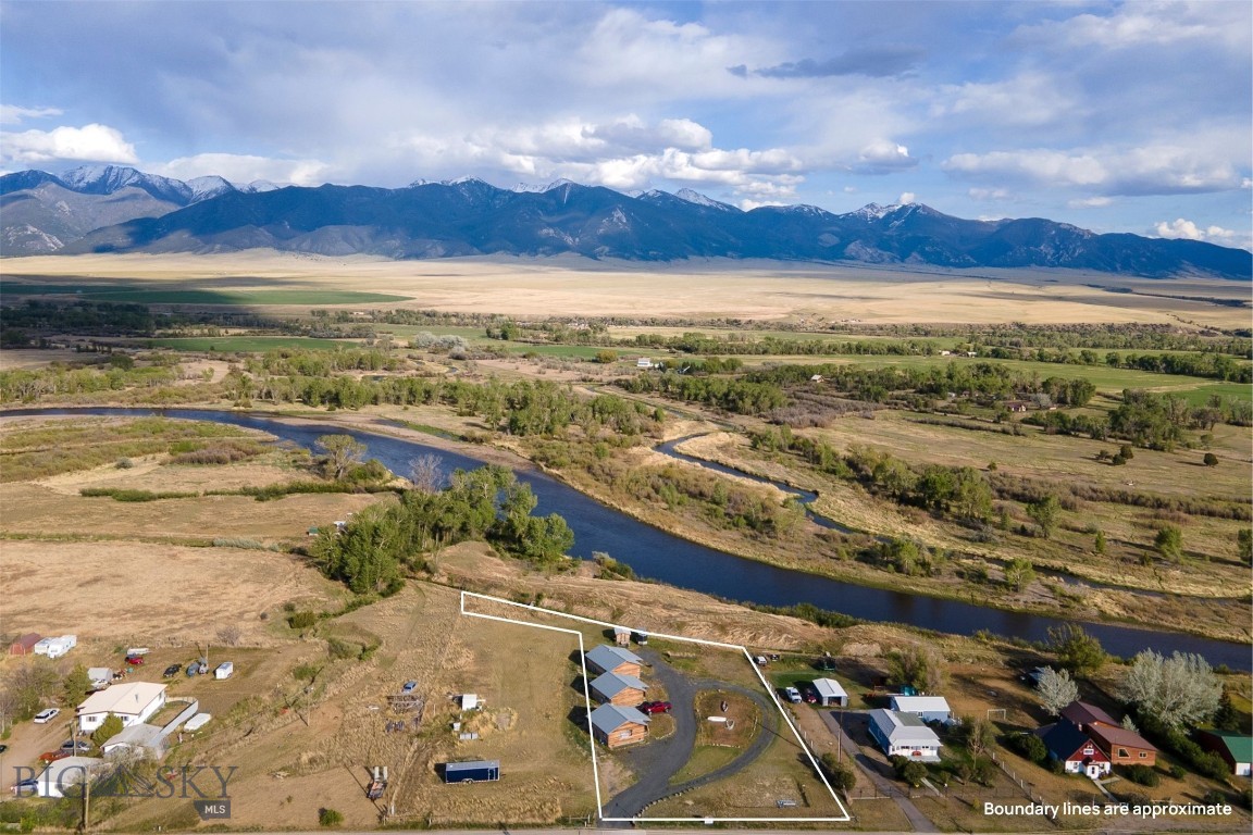 The River Rest Cabins present a rare investment opportunity in Southwest Montana, offering three luxury cabins in an inspiring setting with expansive Tobacco Root Mountain and river valley views. Located in Silver Star just off Highway 41, the property borders state land and provides direct access to the Jefferson River, creating a scenic backdrop ideal for fishing, recreation, and wildlife viewing. The property features three well-appointed cabins: two measuring 576 square feet and one larger 768 square-foot cabin. Each cabin includes 2 bedrooms, 1 bathroom, a comfortable living room, full kitchen, and covered front porch. Built with classic wood siding and durable metal roofs, the cabins combine Montana character with low-maintenance design. The larger cabin also includes a dedicated laundry room, providing added flexibility for owner occupancy or longer-term stays. Offered fully furnished and move-in ready, the River Rest Cabins have a strong history of successful vacation rentals as well as month-to-month occupancy. The layout allows multiple buyer options, including operating all three as income-producing rentals or living in one cabin while renting the others. With private river access, bordering public land, and no CC&Rs, this property delivers versatility, income potential, and a Montana retreat that balances accessibility with recreational opportunities.