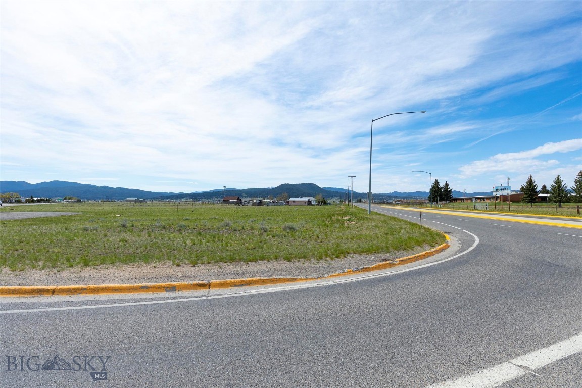Positioned on the highly visible corner of Harrison Avenue, Basin Creek Road, and Highway 2, this C2 zoned commercial lot offers an incredible opportunity in one of Butte’s busiest and most accessible locations. With excellent exposure, strong traffic counts, and convenient access, this property is ideal for a wide variety of commercial uses. With this investment venture, the possibilities here are truly endless. Rarely does a corner commercial parcel with this level of visibility and potential become available in such a prime location.