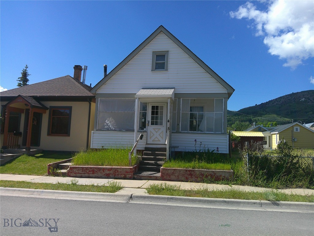 Spacious fixer upper in central location with three bedrooms and one bathroom on two levels.  Features include two enclosed porches, attached one-car garage, partial basement and newer gas forced air furnace.  Selling in "as-is" condition and owner will make no repairs or upgrades.